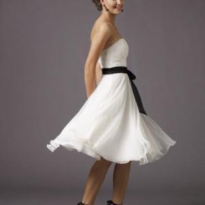 Strapless Empire Bodice With A Line Skirt And Sash..